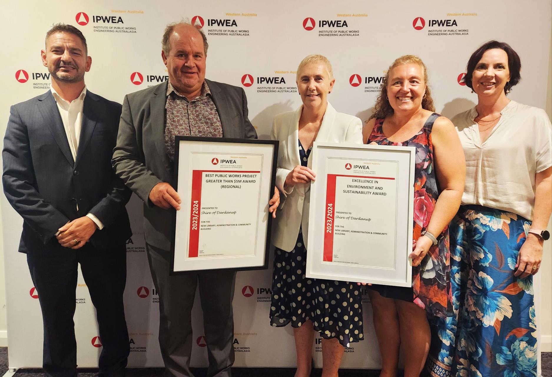 The Shire of Dardanup’s newly constructed Library, Administration, and Community Building (far right) claimed two distinguished awards at the Institute of Public Works Engineering Australasia (IPWEA) Awards held on Friday night. Pictured at the awards ceremony are (from left) CEO André Schönfeldt, Shire President Tyrrell Gardiner, Director Special Projects and Community Susan Oosthuizen, Senior Project Officer Belinda Vanvuuren and Councillor Stacey Gillespie.